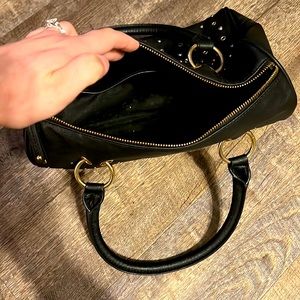 Black and gold studded purse